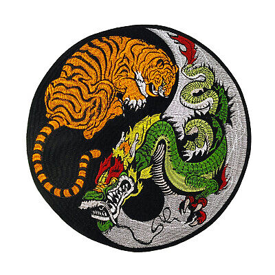 A circular iron-on patch depicting a yin yang symbol with a tiger on the black side and a dragon on the white side.